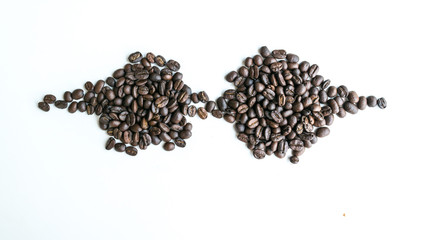 Coffee beans are arranged in a bar image with copy space.