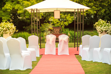 Many wedding chairs with white elegant covers