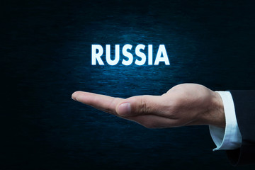 Hand with Russia word