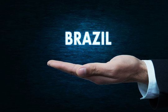 Hand holding Brazil word