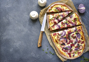 Tarte flambee - traditional rustic french pie.Top view.