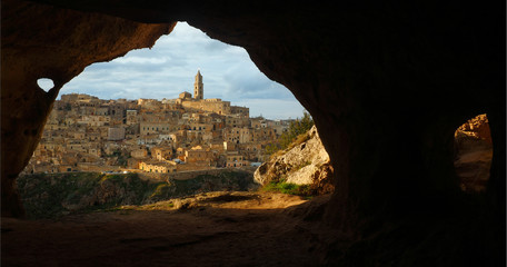 Beautiful Matera panoramic view from caves at sunset, Basilicata, Italy - obrazy, fototapety, plakaty