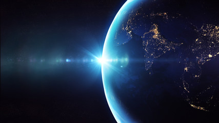 Fototapeta na wymiar Blue sunrise, view of earth from space/Planet earth sunrise meets the city lights. Some elements of this image furnished by NASA