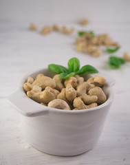 Cashew nuts on white table