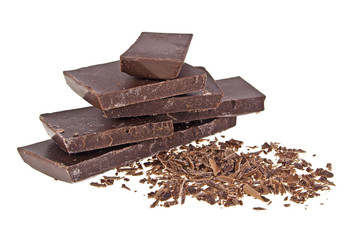 Chocolate bars and chocolate chips on a white background