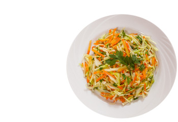 fresh vegetables salad with cabbage and carrot. top view. isolated on white