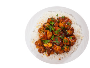 Rice with meat and mushrooms. top view. isolated on white