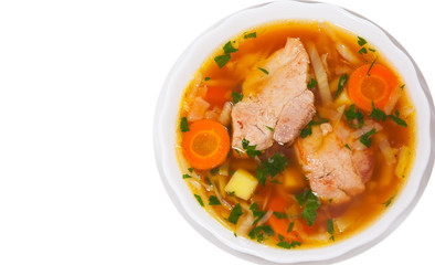 Cabbage soup with meat. top view. isolated on white