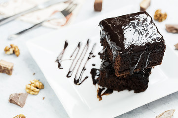 Brownie Cake served on the white plate