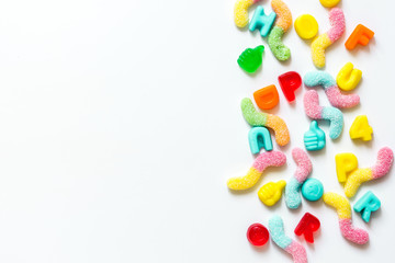 Closeup of candy on white table background top view mockup
