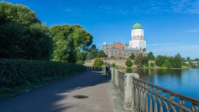 Timelapse of Vyborg Castle (Viipurin linna, Viborgs f&auml;stning) with the Tower of St. Olav, Swedish-built medieval fortress on a small island, view from the embankment, Vyborg, Russia.
