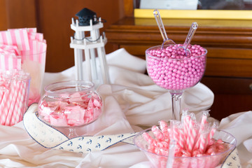 Pink candy bar on the wedding. Sweet decoration at wedding day