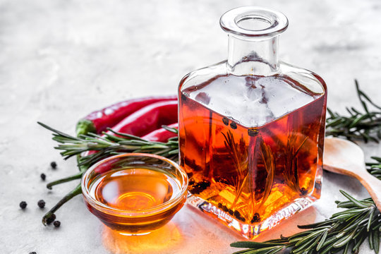natural oils concept with fresh chili paper on table background