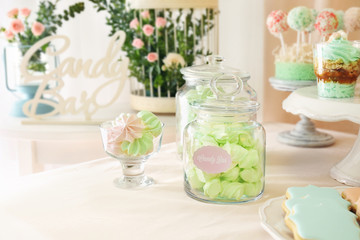Candy bar. Table with different sweets for party