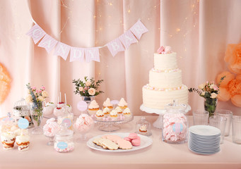 Candy bar. Table with different sweets for party