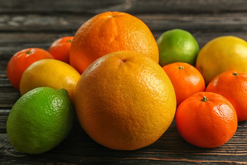 Beautiful composition of tropical fruits on wooden background