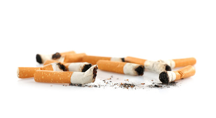 Cigarette butts on white background