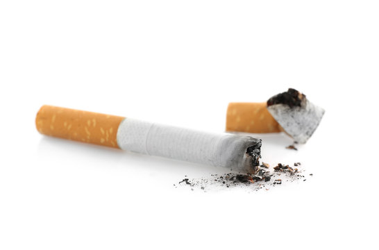 Cigarette butts on white background