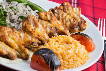 Chicken wings served on plate