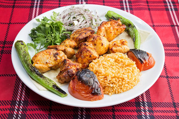 Chicken wings served on plate