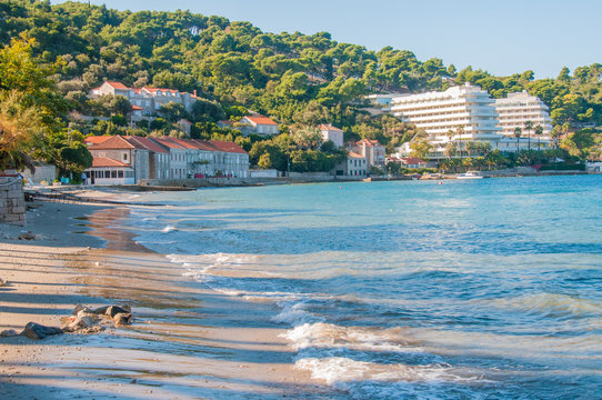Croatian shoreline of beach houses and hotels.