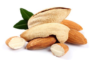 almond isolated on white background. with green leaf 