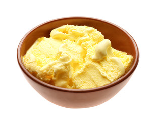 Tasty lemon ice cream in bowl on white background