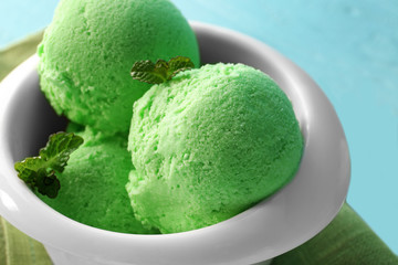 Tasty apple ice cream in bowl, closeup