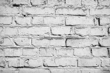 Vintage bricks painted white. Brick wall texture or background.