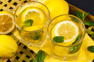 Lemonade Drink with Lemon Juice. Selective and Soft focus.