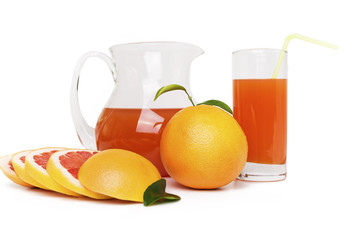 Grapefruit juice in a jug and grapefruit