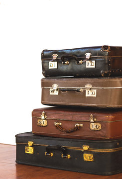 Vintage Pile of Ancient Suitcases. Design and travel concept