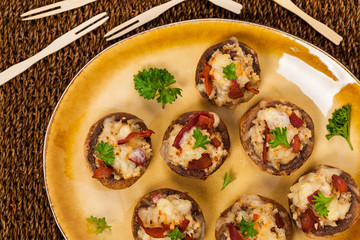 Stuffed Mushrooms with Bacon, Cheese and Breadcrumbs. Selective focus.