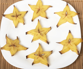 Carambola on white background - slices