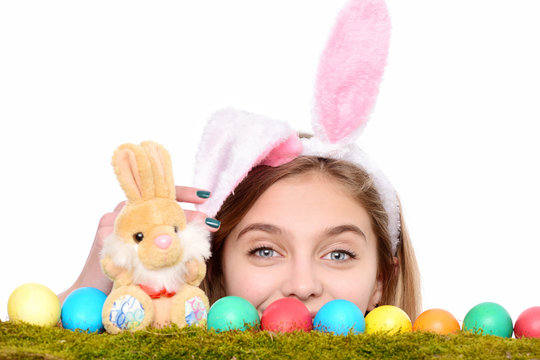 happy easter girl in bunny ears with colorful eggs, rabbit