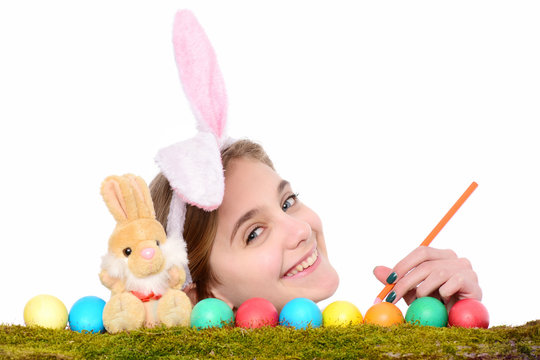 happy easter girl in bunny ears with colorful eggs, pencil