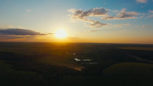 Flying over the lield at Sunset