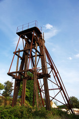 Fototapeta na wymiar iron tower of the old mine