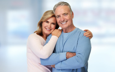 Obraz na płótnie Canvas Senior couple smiling.