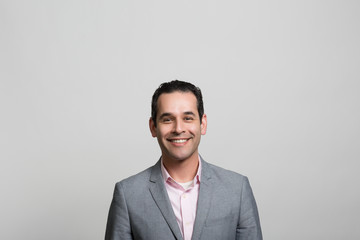 Studio portrait of an excited businessman