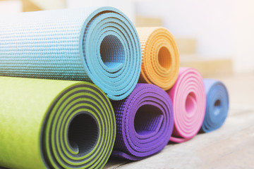 yoga mat on the wood table