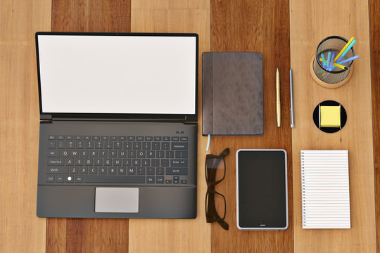 Office desk with notebook glasses keyboard coffee cup and phone top view on wood background.3D illustration.