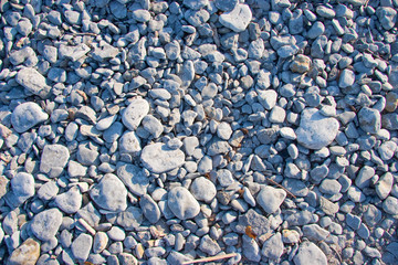 Overhead View of Small Stones on a Beach
