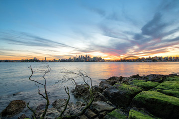 Obraz premium Sydney, Australia - November 6, 2016: View of the Opera House and Harbour Bridge, the two most iconic landmarks in Sydney, Australia on Nature foreground