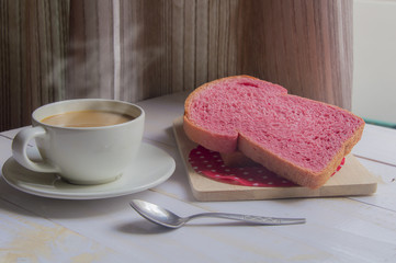 Pink whole wheat bread with espresso coffeemon white woodle.