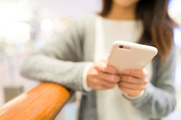 Woman using mobile phone