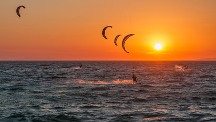 Kite surf and sunset at Mykonos island, Greece.