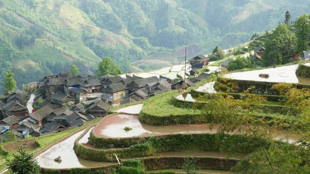 Village and Terraced Rice Field - Jiabang, Guizhou Province, China.