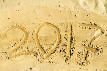 Year 2017 on the beach sand