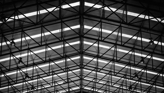 Black and white image of Steel structure roof frame for building construction.